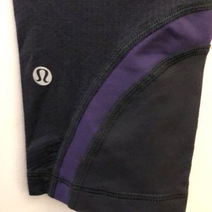 lululemon athletica Pants - Lululemon black &purple run inspire crop sz 8 lululemon athletica Pants - Lululemon black &purple run inspire crop sz 8